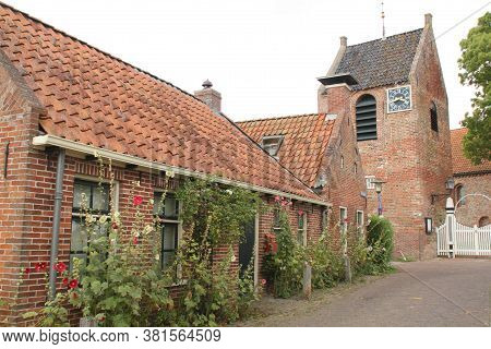 Ezinge. August-16-2020.beautiful House And The Church Of Ezinge From The 13th Century In The Village
