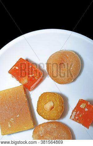 Indian Festival Sweet Dish, Indian Sweets On A White Plate For The Festival Celebrations