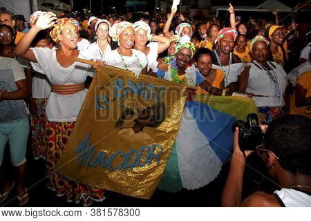 Salvador, Bahia / Brazil - February 22, 2014: Members Of The Bando Anunciador And Residents Of The I