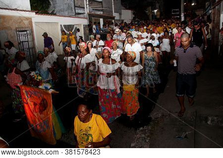 Salvador, Bahia / Brazil - February 22, 2014: Members Of The Bando Anunciador And Residents Of The I