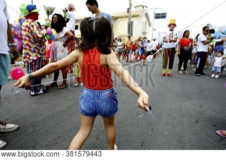 Salvador, Bahia / Brazil - September 21, 2014: Child Is Seen Playing In The Rio Vermelho Neighborhoo