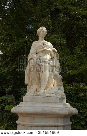 Segovia, Spain - August 12 - 2020: Statue Of A Goddess At The Fountain Of Los Baños De Diana In The 