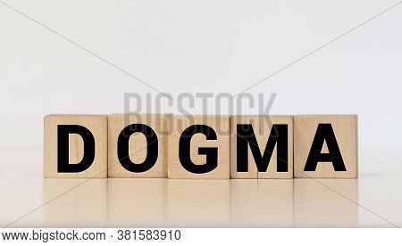 Dogma Word On White Blocks Concept, Business Concept