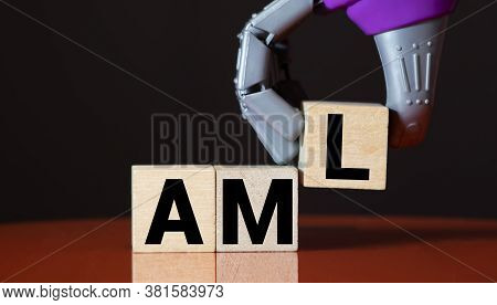 Money Laundering Concept, Wooden Word Block Aml On Plie Of Coins