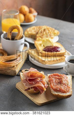 Spanish Breakfast, Tortilla, Bruschetta With Jamon (cured Ham) And Tomatoes, Churros With Chocolate,