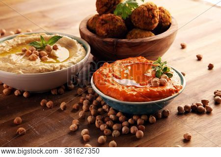 Traditional Homemade Hummus, Falafel And Chickpea On Rustic Table. Jewish Cuisine.