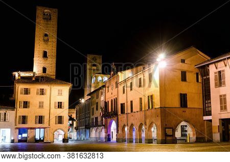 Piazza Risorgimento And The Medieval Towers Of Via Cavour, One Of The Main Street Of The Town Center