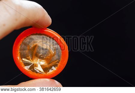 One Quality Orange Latex Condom, The Condom Is Not In The Package, Made Of Natural Latex To Prevent 