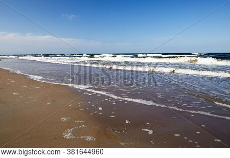 The Coast Of The Baltic Sea In The Summer, The Month Of August, The Beautiful Nature, And The Restle