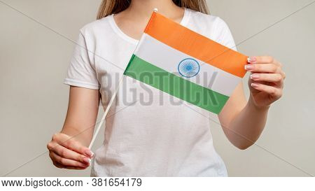 India Flag. Independence Day. Woman Holding Official Symbol Horizontal Tricolor With Saffron Orange 