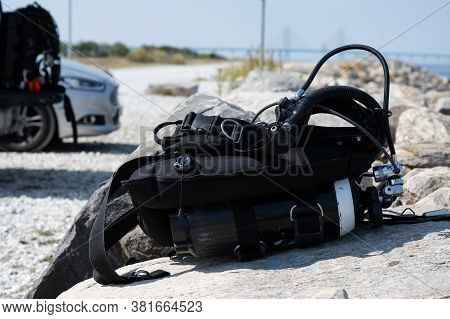 Scuba Equipment On A Stone. The Island, On In Swedish, Is A Very Popular Spot For Scuba Diving In Ma