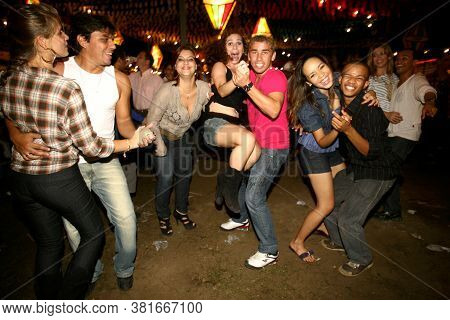 Ilheus, Bahia / Brazil - June 23, 2011: People Are Seen Dancing Forro And Hillbilly Dresses During S