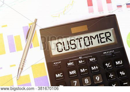 Word Customer Plus On Calculator. Business And Tax Concept