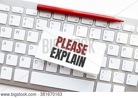 Words Please Explain Written On Torn Paper On A Computer Keyboard