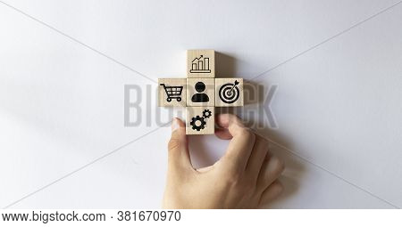 Sale Volume Increase Make Business Success, Hand Holding Wood Cube With Icon Goal And Shopping Cart