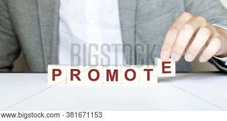 Word Promote Made With Wood Building Blocks