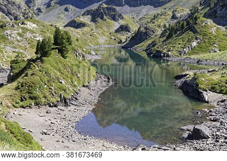 The Green Mountain Lake Know As Lac Longet Between Hills