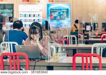 Bangkok-thailand, July 14, 2020: Unidentified Customers Work On Computer With Smartphone And Relax W