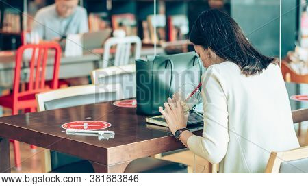 Bangkok-thailand, July 14, 2020: Unidentified Customers Work On Computer With Smartphone And Relax W