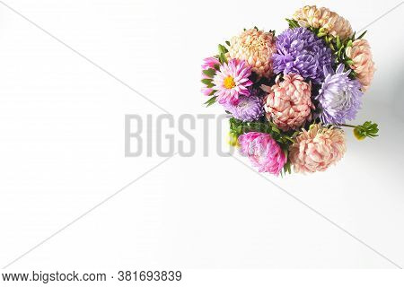 Beautiful Fall Bouquet Of Fresh Asters On A White Background. Simple Flat Composition, Copy Space, T