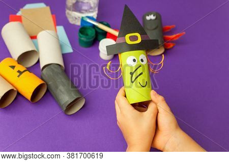 Boy Makes Halloween Toys From Paper. Toilet Roll Tube By Hands. Creative Diy For Kids On Traditional