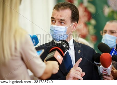 Bucharest, Romania - August 20, 2020: Prime minister Ludovic Orban makes press statements about his dismissal proceedings started by PSD in the joint meeting of the reunited chambers of the Parliament