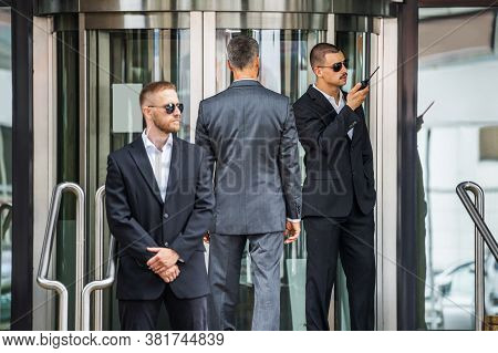 Security Guard Service Protecting Business Man Outside