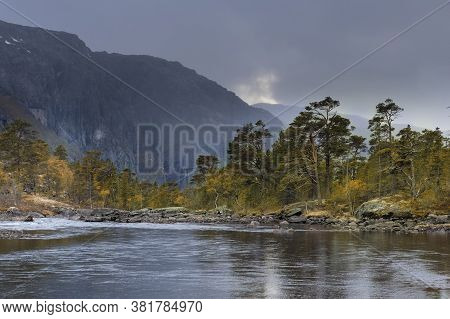 Norway Nature Fall Landscape, River In The National Park Valley Of The Husedalen Waterfalls At Sunse