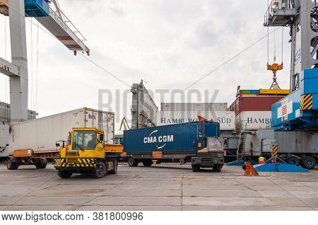 Szczecin, Poland - May 12, 2011: Unloading A Container Ship In The Stetting Sea Port In Poland. The 