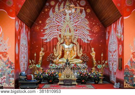 Phayao, Thailand - August 18 2020: Gold Buddha Statue At Chapel In The Pool At Wat Si Khom Kham, Pha