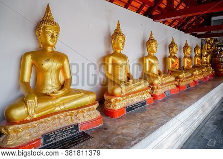 Phitsanulok, Thailand - July 04 2020 Row Of Gold Buddha Statue At At Phra Si Rattana Mahathat Temple