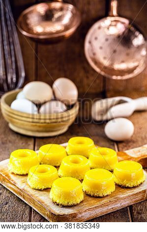 Brazilian Quindim Is A Sweet Made From Egg Yolk, Sugar And Grated Coconut. Corresponds To The Portug
