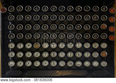 Latinic Keyboard Of Old Vintage Antique Typewriter With Round Buttons Close Up, High Angle View, Per