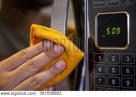 Cleaning Microwaves Against Coronavirus During Pandemic In Quarantine