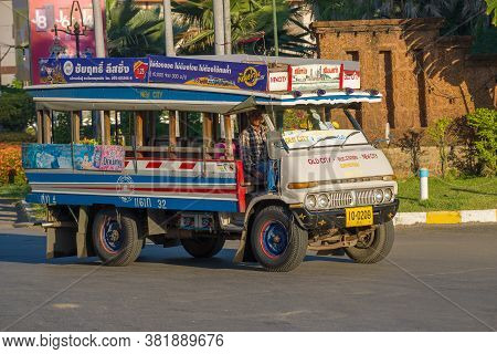 Sukhotai, Thailand - December 26, 2018: Shuttle Bus (songthaew) At The Base Of An Old Hino Truck Clo