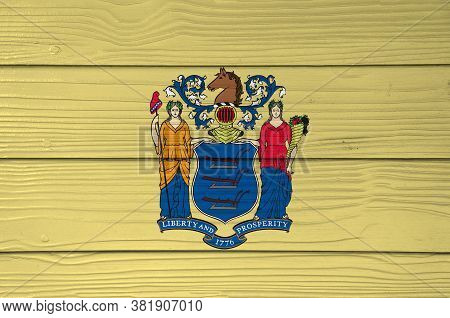 New Jersey Flag Color Painted On Fiber Cement Sheet Wall Background, The States Of America. The Stat