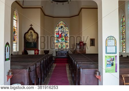 Luderitz, Namibia - June 14, 2011: Inside Of  The Lutheran Church In Luderitz. Stained Glass Window 