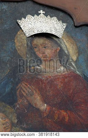 NOVALJA, CROATIA - SEPTEMBER 29, 2013: Virgin Mary with child Jesus, altarpiece at St. Mary's Church in Novalja, Croatia