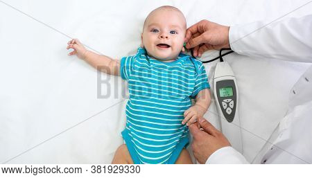 Newborn Hearing Screening And Diagnosis At The Hospital. Baby Having Hearing Screening, Otoacoustic 