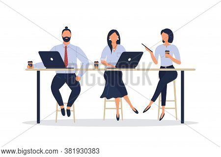 Women And Man Friends Or Colleagues Sitting At Desk In Loft Office Or Cafe,working At Notebook And T