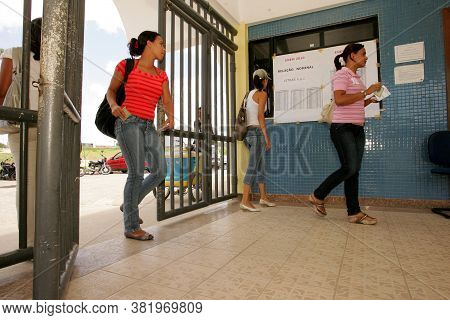 Eunapolis, Bahia / Brazil - November 6, 2010: People Look At Attendance List For Exams Of The Nation