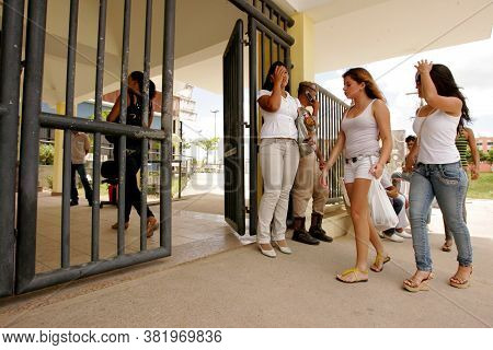 Eunapolis, Bahia / Brazil - November 6, 2010: People Look At Attendance List For Exams Of The Nation