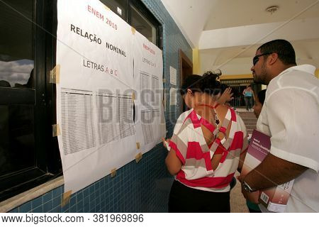 Eunapolis, Bahia / Brazil - November 6, 2010: People Look At Attendance List For Exams Of The Nation