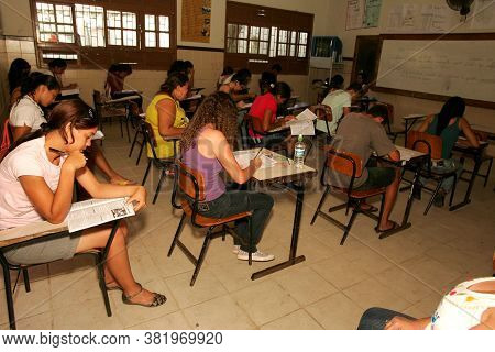 Eunapolis, Bahia / Brazil - November 6, 2010: People Are Seen Taking Exams At The National High Scho