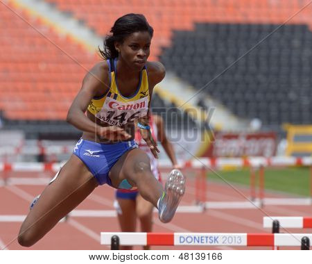 DONETSK, UKRAINE - JULY 11: Tia-Adana Belle of  Barbados compete in semi-final of 400 m hurdles during 8th IAAF World Youth Championships in Donetsk, Ukraine on July 11, 2013