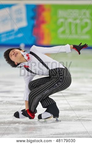 INNSBRUCK, Østrig - januar 16 Alexander Lyan (Kazachstan) placerer 1300 i mændenes kunstskøjteløb 