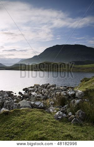 Beautiful Sunrise Mountain Landscape Reflected In Calm Lake