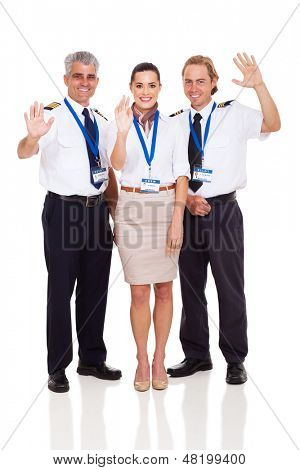 จัดเตรียมร่าเริงและ airhostess โบกบนพื้นหลังสีขาว