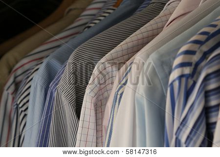 Hanging Shirts Of Businessman