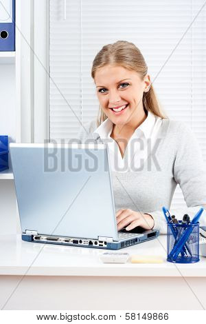 Businesswoman using laptop